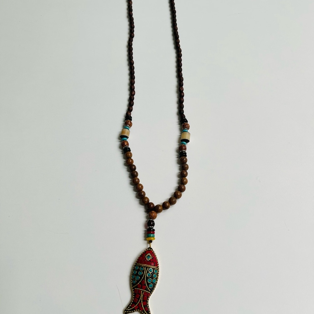 Brown beads with brown and teal fish